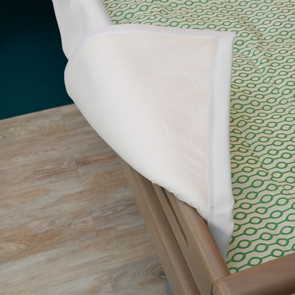 Bedhekbeschermer voor onrusthekken. eenvoudig te bevestigen met klittenband. Detail van dichtbij.