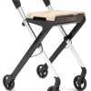 Rollator Rollbuddy wit met omgekeerd remsysteem en lichtgewicht frame voor gebruik binnenshuis.