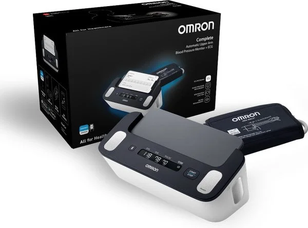 Dit is de OMRON Complete. met de doos Het is een bloeddrukmeter en ECG
