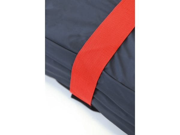 Detail van het Matras Novacare ASX 6 Digital met rode draag- of bevestigingsriem over donkerblauwe drukcellen.