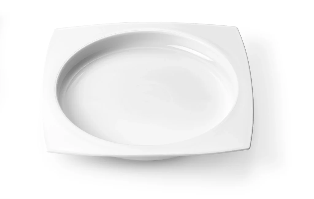 Bord met opstaande rand voor zelfstandig eten en minder knoeien