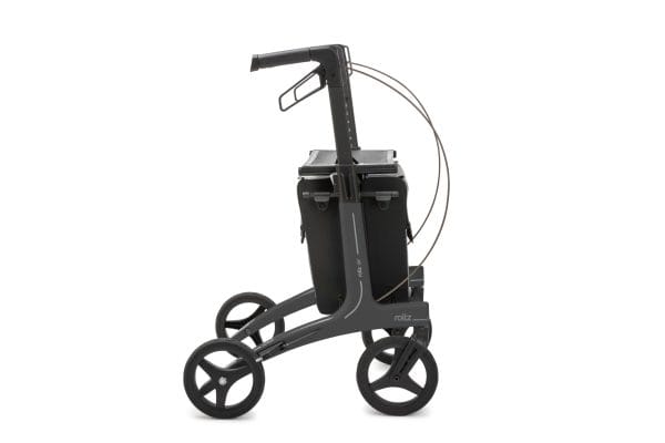 Rollz Air ultralichte carbon rollator, zijaanzicht: slank donkergrijs frame met twee tassen en vier grote, zachte wielen.
