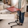 Canterbury bedleestafel met verrijdbaar rood blad en zwarte voet, geschikt voor lezen en eten naast bed of stoel