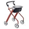 TrustCare Let's Dream binnenrollator in rood met dienblad, stoffen tas en vier wielen.