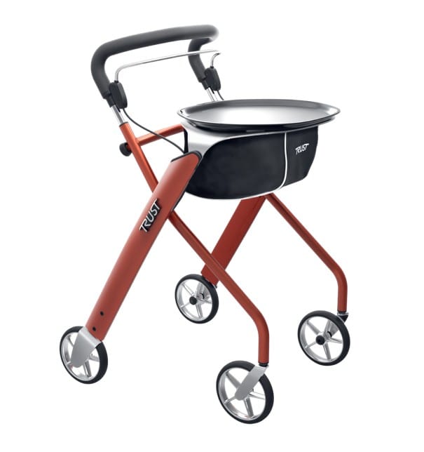 TrustCare Let's Dream binnenrollator in rood met dienblad, stoffen tas en vier wielen.