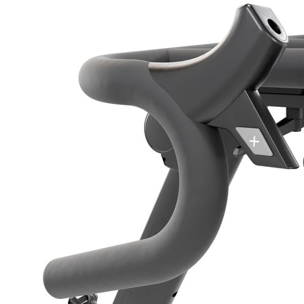Zwarte Flow Fitness Perform S2i spinningfiets met gebogen stuur en plusknop voor weerstand, in gedetailleerde close-up